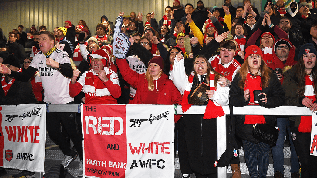 Arsenal Women supporters cheering on their team at Meadow Park